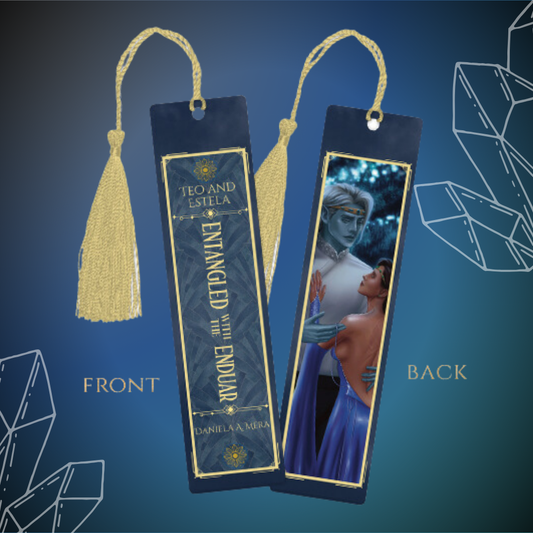 Front and back image of bookmark; includes gold tassel. Front is a stylized golden border with title " Entangled with the Enduar" by Daniela A. Mera; back is artist illustration of Teo and Estela embracing.